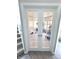Open french doors looking into a carpeted bonus room and play area at 1056 Bent Branch Ln, Greenwood, IN 46143