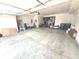 Spacious garage with concrete floors, bare walls, and room for multiple vehicles at 1056 Bent Branch Ln, Greenwood, IN 46143