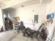 Spacious garage provides ample storage space for tools and equipment with a durable, unfinished concrete floor at 1056 Bent Branch Ln, Greenwood, IN 46143