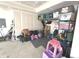 Garage featuring concrete flooring, ample space, overhead lighting, and extra storage capacity at 1056 Bent Branch Ln, Greenwood, IN 46143