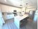 Spacious kitchen with white cabinets, granite countertops, and stainless steel appliances at 1056 Bent Branch Ln, Greenwood, IN 46143