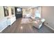Well-lit living room showcasing a comfortable sectional sofa, modern fireplace and decor at 1056 Bent Branch Ln, Greenwood, IN 46143