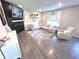 Bright living room featuring a modern fireplace, large sectional, and stylish decor at 1056 Bent Branch Ln, Greenwood, IN 46143