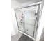 Glass-enclosed shower with tiled walls and modern fixtures at 1056 Bent Branch Ln, Greenwood, IN 46143