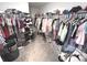 Walk-in closet providing ample storage space for clothing and accessories at 1056 Bent Branch Ln, Greenwood, IN 46143