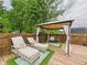 Relaxing backyard deck with lounge chairs and private gazebo at 1117 Oregon Way, Anderson, IN 46012