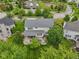 Aerial view of a home's backyard with patio and lush lawn at 11844 Pine Meadow Cir, Fishers, IN 46037
