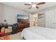 Bedroom view with a TV, dresser, Indiana and Colts flags, carpet floors and a ceiling fan at 11844 Pine Meadow Cir, Fishers, IN 46037