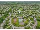 Aerial view of community amenities, including a pool, tennis court, basketball court, and playground at 11844 Pine Meadow Cir, Fishers, IN 46037