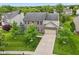 Beautiful home with brick and siding exterior, well-manicured lawn, and attached two-car garage at 11844 Pine Meadow Cir, Fishers, IN 46037