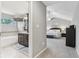 View into bathroom from spacious main bedroom featuring vaulted ceilings, neutral colors, and soft carpeting at 11844 Pine Meadow Cir, Fishers, IN 46037