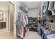 Bright closet featuring wire shelving, carpeted floors, and plenty of storage space for clothes and shoes at 11844 Pine Meadow Cir, Fishers, IN 46037