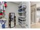 Bright closet featuring wire shelving and carpeted floors. Plenty of space to store clothing and accessories at 11844 Pine Meadow Cir, Fishers, IN 46037
