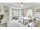 bedroom featuring 3 windows, neutral paint, and carpet at 12437 Meeting House Rd, Carmel, IN 46032
