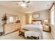 Relaxing bedroom with a king-size bed, ample natural light, and neutral color scheme at 12437 Meeting House Rd, Carmel, IN 46032