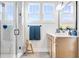 Bathroom featuring a glass-enclosed shower, bright white quartz countertop, and modern fixtures at 13406 Vickery Ridge Dr, Fishers, IN 46037