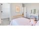 Bright bedroom with a vanity area and view to another doorway at 13406 Vickery Ridge Dr, Fishers, IN 46037