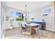 Dining area showcases a wood table, chairs, and a view of the outdoors at 13406 Vickery Ridge Dr, Fishers, IN 46037