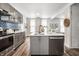 Stylish kitchen with a gray island, stainless steel appliances, and an open layout for easy entertaining at 1418 Olive St, Indianapolis, IN 46203