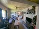 Cozy living room with a ceiling fan, window, and furniture at 1433 N Denny St, Indianapolis, IN 46201