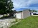 Detached single garage with white door, providing convenient parking and additional storage space at 1527 Main St, Beech Grove, IN 46107