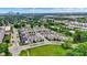 Extensive aerial shot of community blending seamlessly into the cityscape with homes nestled among lush greenery and trees at 158 Handley St, Indianapolis, IN 46222
