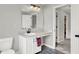 Stylish bathroom featuring a sink with bronze fixtures and an open doorway at 158 Handley St, Indianapolis, IN 46222