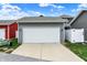 Detached two-car garage with a white garage door and gray siding at 158 Handley St, Indianapolis, IN 46222