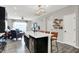 Modern kitchen with stainless steel appliances, island seating, and open floor plan at 158 Handley St, Indianapolis, IN 46222