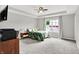 Spacious main bedroom with tray ceiling, large window, and comfortable carpet flooring, provides a relaxing retreat at 158 Handley St, Indianapolis, IN 46222