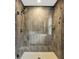 Modern bathroom featuring glass-enclosed shower with tile surround and updated fixtures at 158 Handley St, Indianapolis, IN 46222