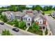 A street view showcases charming homes with colorful exteriors and well-maintained landscaping, creating an inviting neighborhood appeal at 158 Handley St, Indianapolis, IN 46222