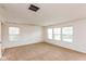 Carpeted, airy bedroom with three large windows offering great light and ventilation at 163 Clear Branch Dr, Brownsburg, IN 46112
