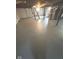 Spacious basement with painted floor, visible beams, and utilities at 1722 Dawson St, Indianapolis, IN 46203