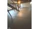 Basement with painted floor and open utility connections at 1722 Dawson St, Indianapolis, IN 46203
