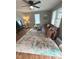 Sun-lit living room featuring hardwood floors and an area rug at 1722 Dawson St, Indianapolis, IN 46203