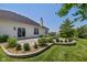 Beautiful backyard with a patio area, fire pit, and mature landscaping at 1854 Oconnor Ct, Avon, IN 46123