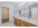 Bathroom features a double vanity, a walk-in closet, and bright lighting at 1854 Oconnor Ct, Avon, IN 46123