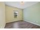 Bedroom has yellow and green walls, and wood-look floors with window views at 1854 Oconnor Ct, Avon, IN 46123
