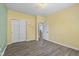 Bright bedroom with a neutral palette and modern closet doors at 1854 Oconnor Ct, Avon, IN 46123