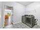 Well-equipped laundry room featuring modern washer and dryer and decorative flooring at 1854 Oconnor Ct, Avon, IN 46123