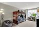 Cozy ' bedroom with a bunk bed, beanbag chair, and natural light from a window at 19843 Moorpark Lndg, Noblesville, IN 46062