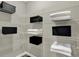 Walk-in closet with multiple shelves displaying folded towels and containers for storage at 19843 Moorpark Lndg, Noblesville, IN 46062