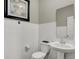 Stylish half bathroom with white subway tile, modern fixtures, and a sleek pedestal sink at 19843 Moorpark Lndg, Noblesville, IN 46062