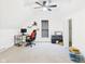 Finished attic space with carpeting, a desk, and a ceiling fan at 201 N 11Th St, Elwood, IN 46036