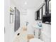 Classic bathroom features patterned tile floors and modern fixtures at 201 N 11Th St, Elwood, IN 46036