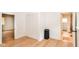 Neutral bedroom with wood flooring, white trim, and a closet with bifold doors at 201 N 11Th St, Elwood, IN 46036