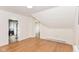 Spacious bedroom featuring light colored wood floors and two doorways to other rooms at 201 N 11Th St, Elwood, IN 46036