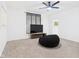 Neutral bedroom with modern ceiling fan, window, and carpeted floors at 201 N 11Th St, Elwood, IN 46036