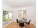 Dining Area with sliding glass doors and wood laminate flooring at 201 N 11Th St, Elwood, IN 46036